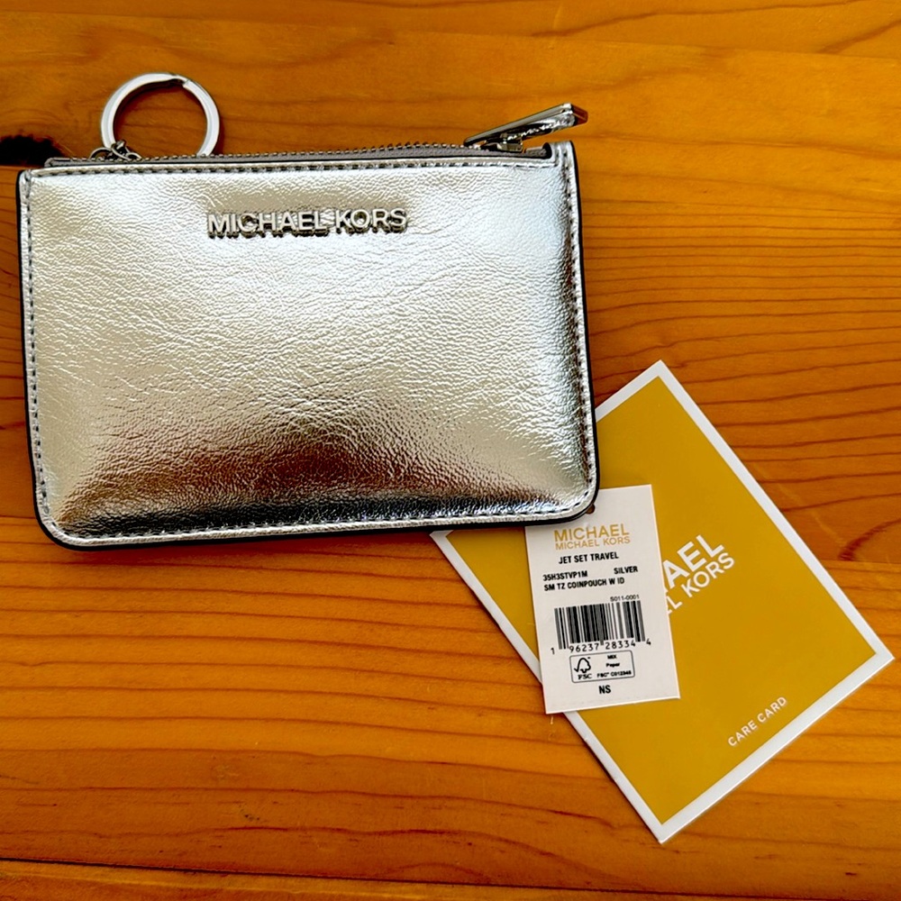 Silver Michael Kors wallet.